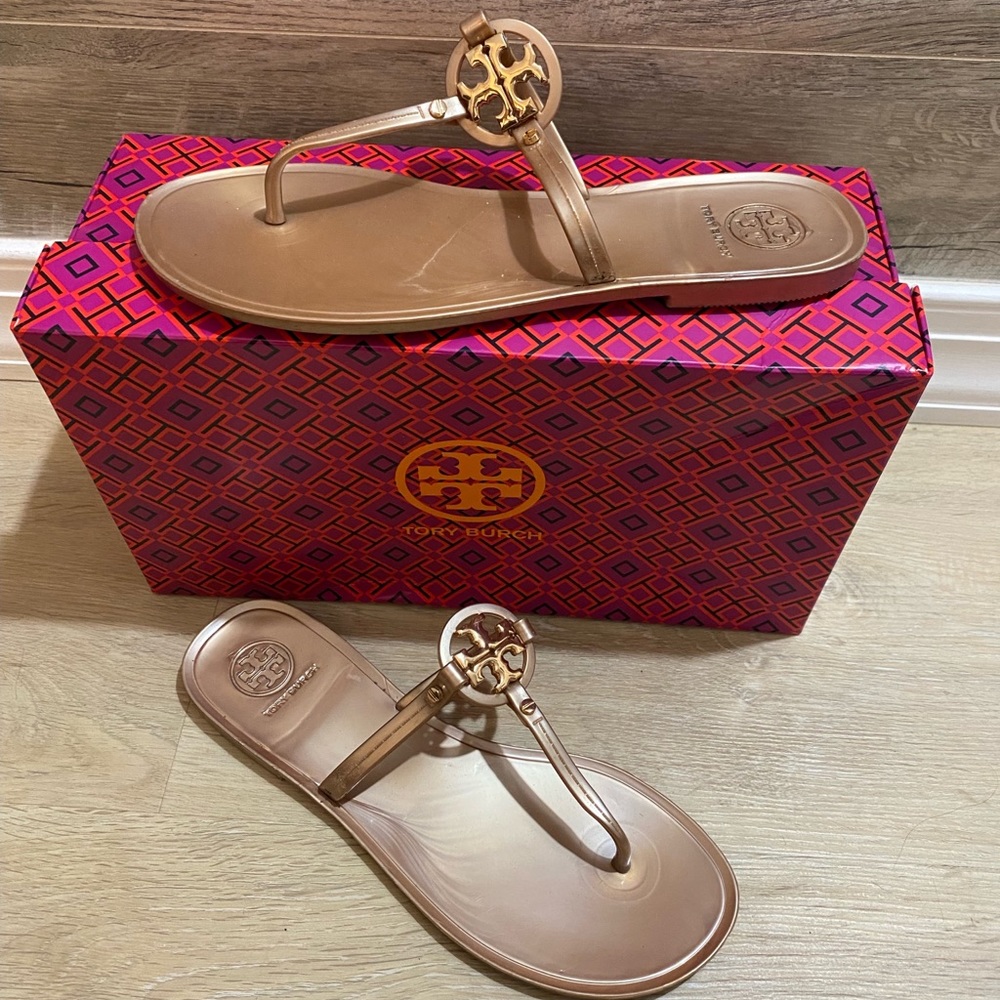 Rose Gold Tory Burch sandals lightly used .
